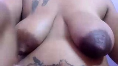 Big boob brunette masturbates on webcam