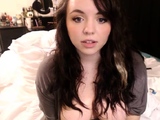Busty curly brunette with big boobs fucks on couch