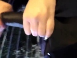 Dazzling blonde babe sucks a big black dick in a store