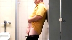 Masturbating in a public bathroom