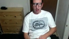 Cute nerdy boy cum to face on webcam