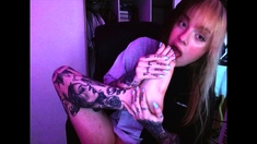 Sexy leggy brunette enjoys foot fetish