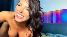Busty curly brunette with big boobs fucks on couch
