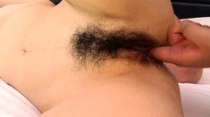 Naughty amateur asian slut opens hairy pussy for huge toys