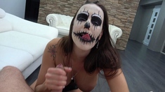 She's sucking dick with halloween face paint