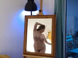 Busty curly brunette with big boobs fucks on couch
