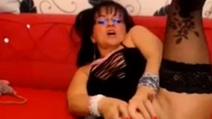 Blonde Cougar Plays With Sex Toy On Webcam