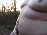 Chubby masturbates in the woods